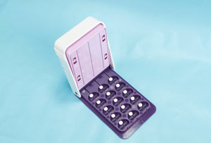 30 Day Multiple Pill Cutter with small round pills top side view