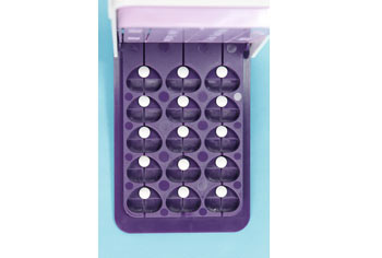 30 Day Multiple Pill Cutter with small round pills top view